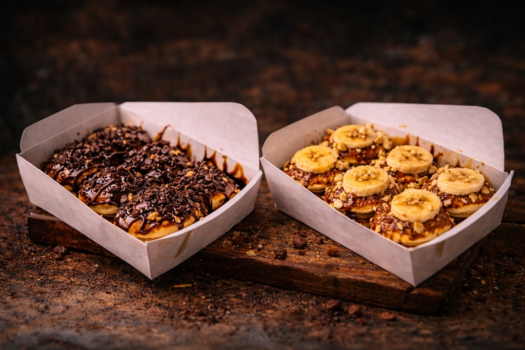 Double the Cravings - Two premium boxes of our signature mini pancakes (Nutella & Banana) for just ₹199